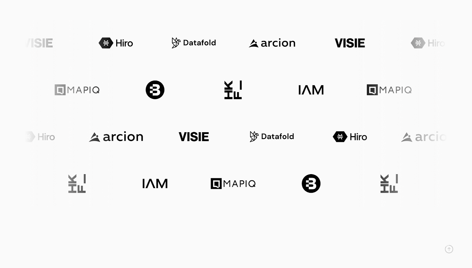 MN Studio’s website has ample white space between logos in its clientele section, with black logos on a white background.