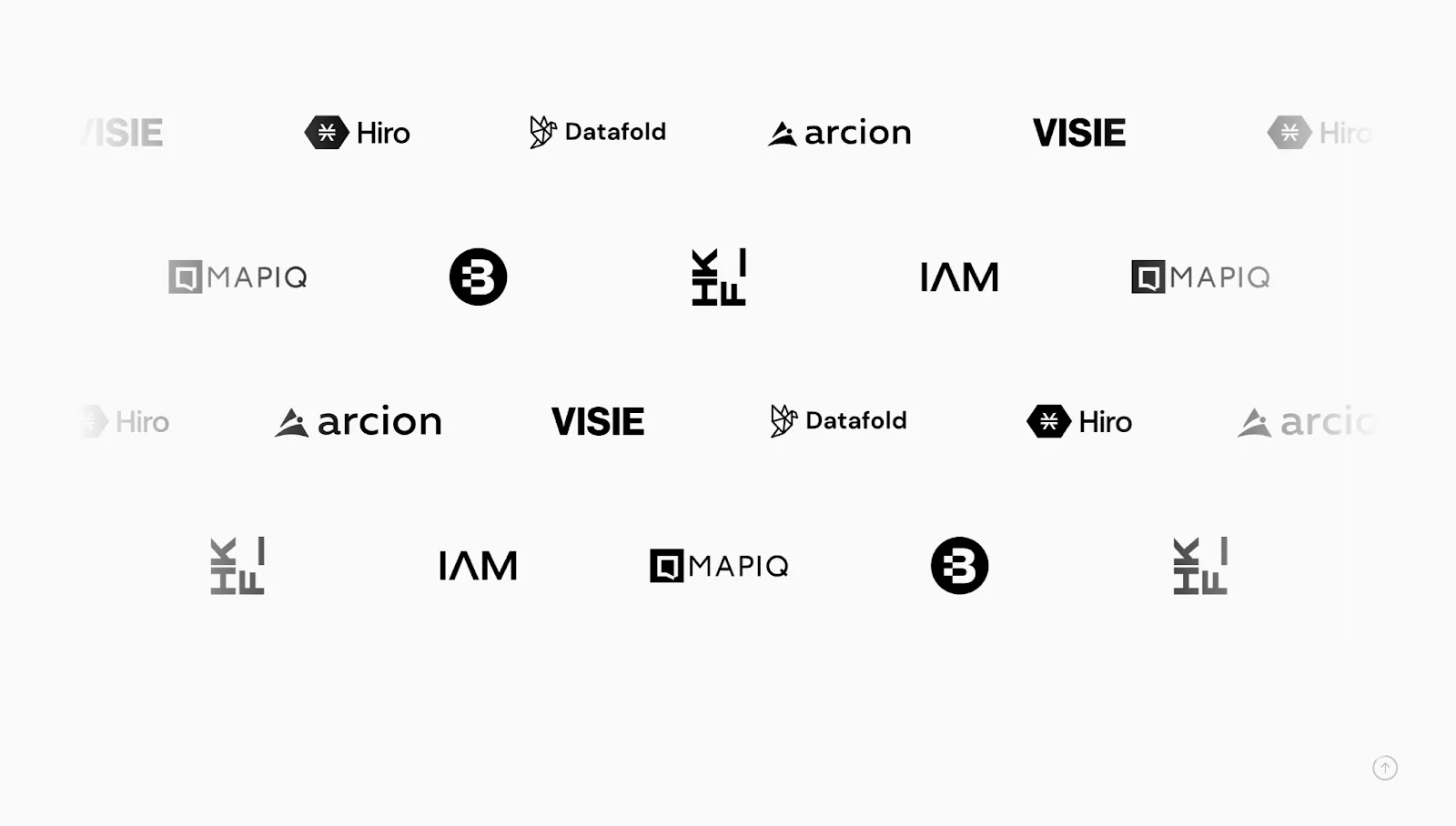 MN Studio’s website has ample white space between logos in its clientele section, with black logos on a white background.